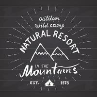 Mountains handdrawn sketch emblem. outdoor camping and hiking activity, Extreme sports, outdoor adventure symbol, vector illustration on chalkboard background