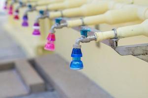Colorful faucet water photo