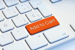 Add to cart orange on computer Keyboard Key photo