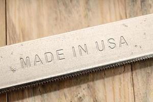 Made in USA engraved on steel object photo