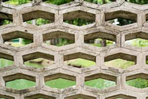 old hexagon Hollow concrete block wall background photo