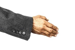 grunge style of dry and dirty hand of old aged businessman on white background  isolated photo