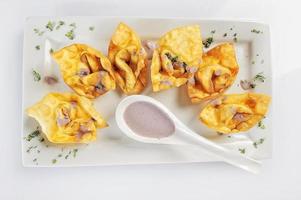 chifa fried peruvian wonton fusion food food display photo