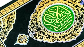 Islamic Concept Isolated close up the holy Quran photo