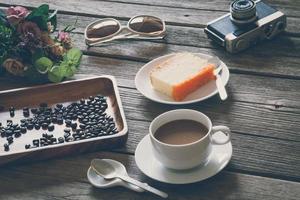 Vintage Film Look cup of coffee with cake photo