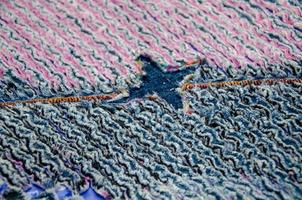 Denim and cotton chenille carpet, texture fluffy photo