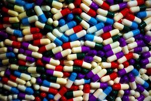 Pile of colorful pills photo