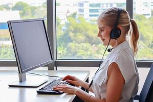 Business women work with laptop at home on vacation photo