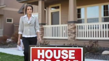 Realtor in front of a house video