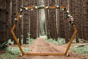 wedding ceremony in woods photo