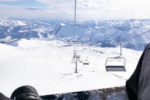 Snowboarding in caucasus mountains photo