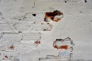 white old broken wall textured background photo