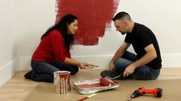 Couple painting room together video