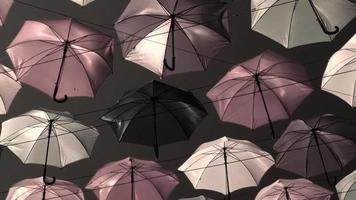 Magical color umbrellas sweep overhead video