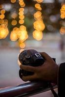 DSLR Camera on Bokeh Background Black DSLR Camera With Bokeh Lights Photo and Camera City Lights Bokeh