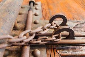 rusty chain lock wood door photo