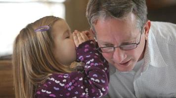 Grandfather and granddaughter whisper secret video