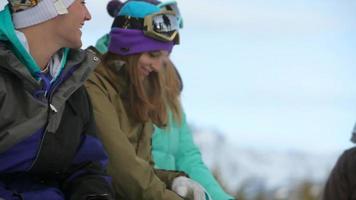 Group of young snowboarders on the slopes video