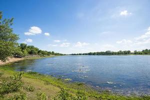 Reservoir with blue sky photo