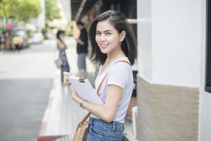 A portrait of an Asian university student on campus photo