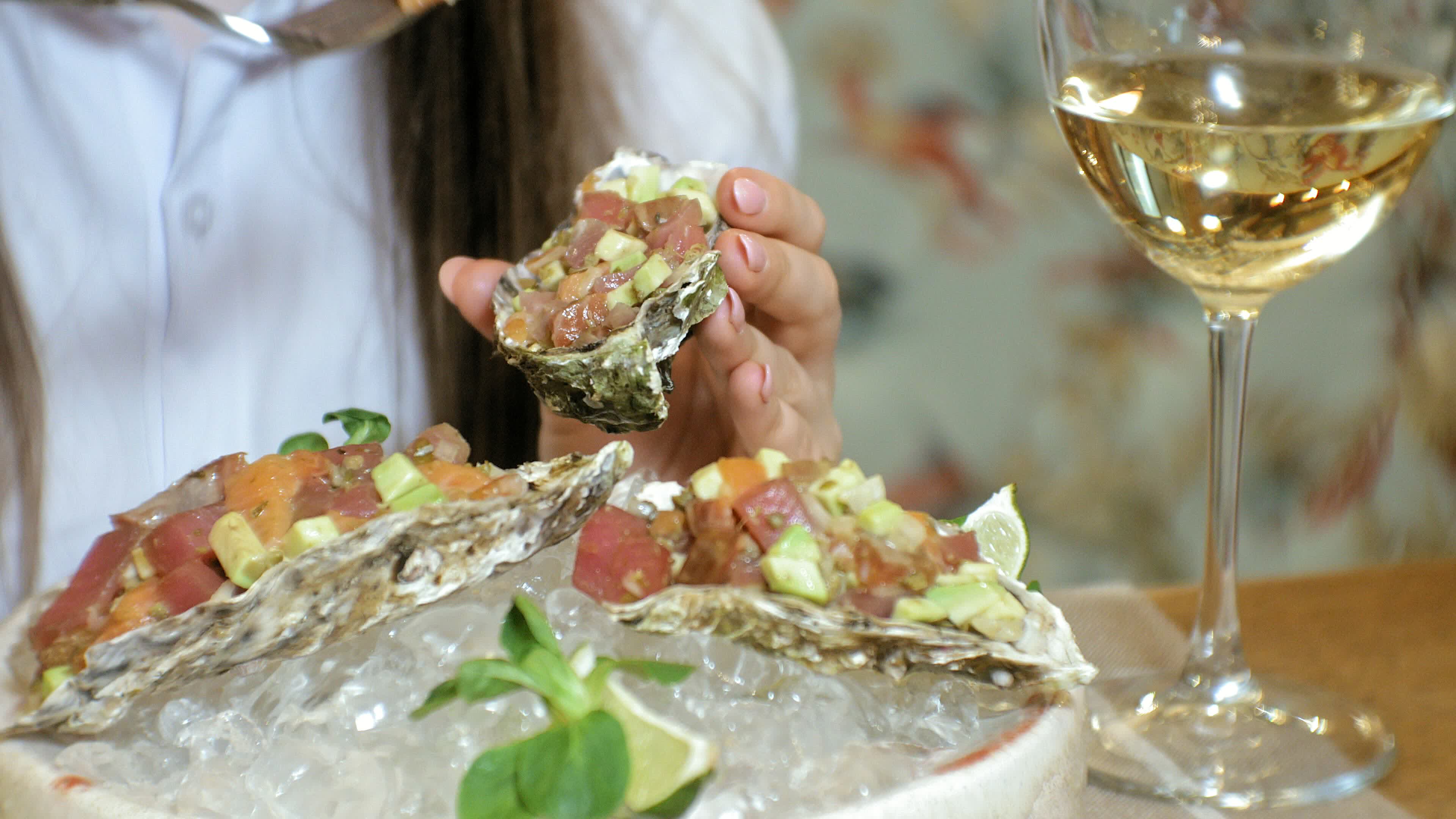 close up shooting a delicious raw fish dish salmon tar tar with avocado ...