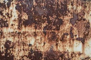 óxido en el fondo de textura de pared de metal antiguo foto