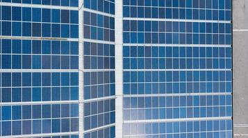 Aerial top view of the solar cells on the roof photo