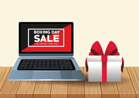 boxing day sale poster with laptop and gift vector