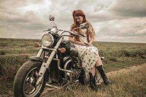 red haired girl in a white dress and boots along with a motorcycle lavender field photo