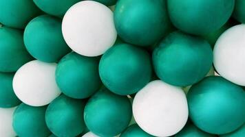 Green and white balloons background photo