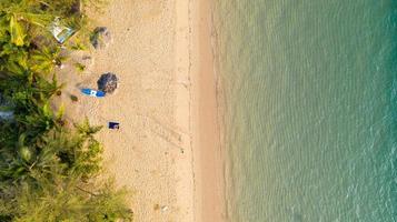 Aerial view  Sea view Amazing thailand nature background Water and beautifully bright beach with kayak on ocean at sunny day photo