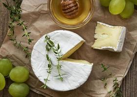 Camembert cheese with snacks photo