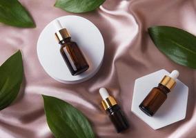 Flat lay composition with herbal essential oils photo