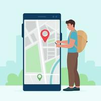 A male tourist with a phone in his hands uses electronic maps to find a location vector