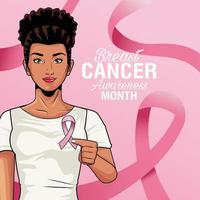 breast cancer awareness month lettering with woman lifting pink ribbon vector