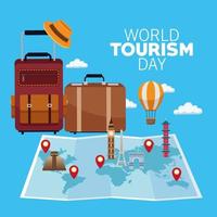 world tourism day lettering celebration with paper map and suitcases vector