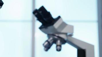 Closeup of microscopes in science lab video