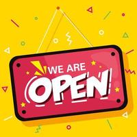 we are open label hanging on yellow background vector