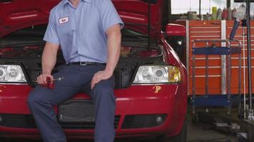 Portrait of auto mechanic video