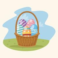 happy easter card with eggs painted in basket vector