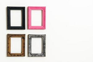 Empty picture frame on white wall background with copy space photo