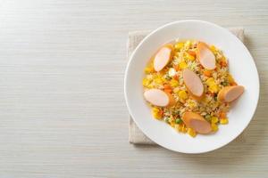 Fried rice with sausage and mixed vegetables photo