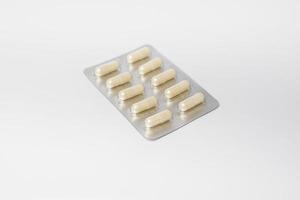 Pills panel isolated on white background photo