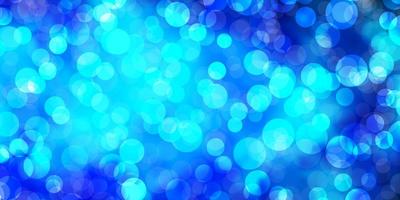 Light BLUE vector background with spots