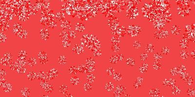 Light orange vector background with christmas snowflakes