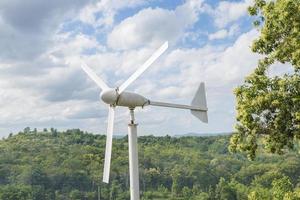 Wind turbine with blue sky photo