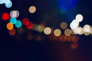 multicolored bokeh street lights at night photo