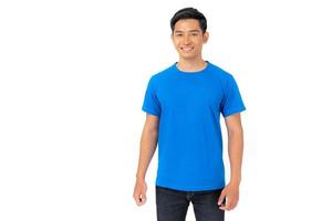 Young man in blue t shirt isolated on white background photo