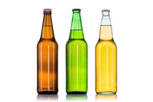 Group of Three bottles of beer isolated on white background photo