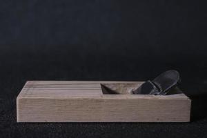 Japanese hand plane on a black background photo